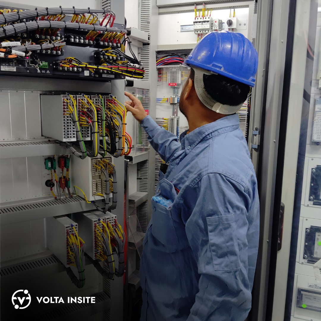 inspecting electrical panel for downtime