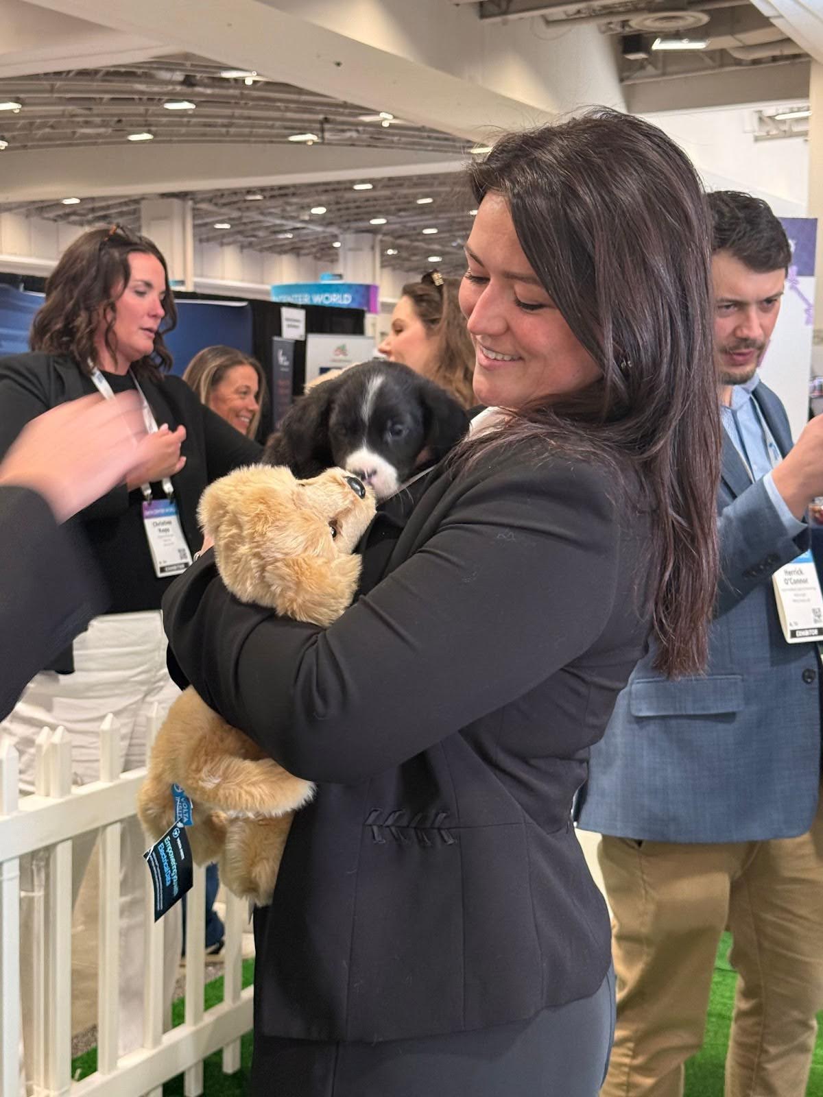 Amber with Volta Insite's mascot Maxwell at Data Center World April 2025